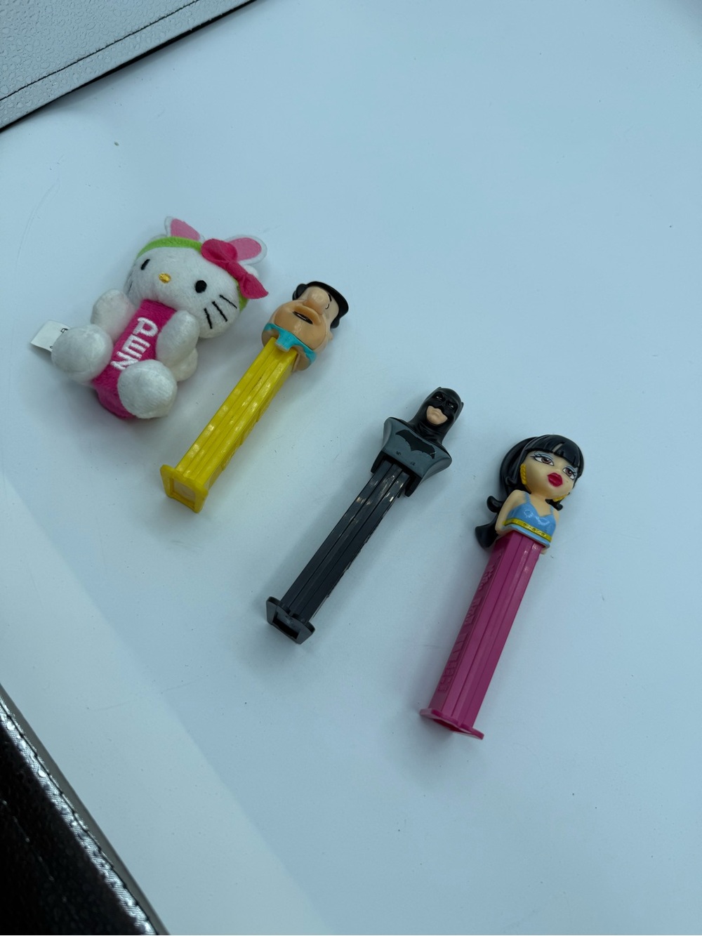 Lot Of 4 Mixed Pez Dispensers Hello Kitty Bratz Flintstones Batman